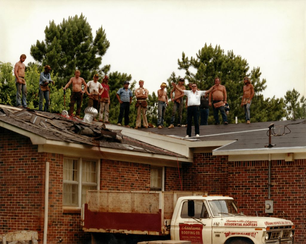 The Cooper roofing crew on a Huntsville job in the early years of the company